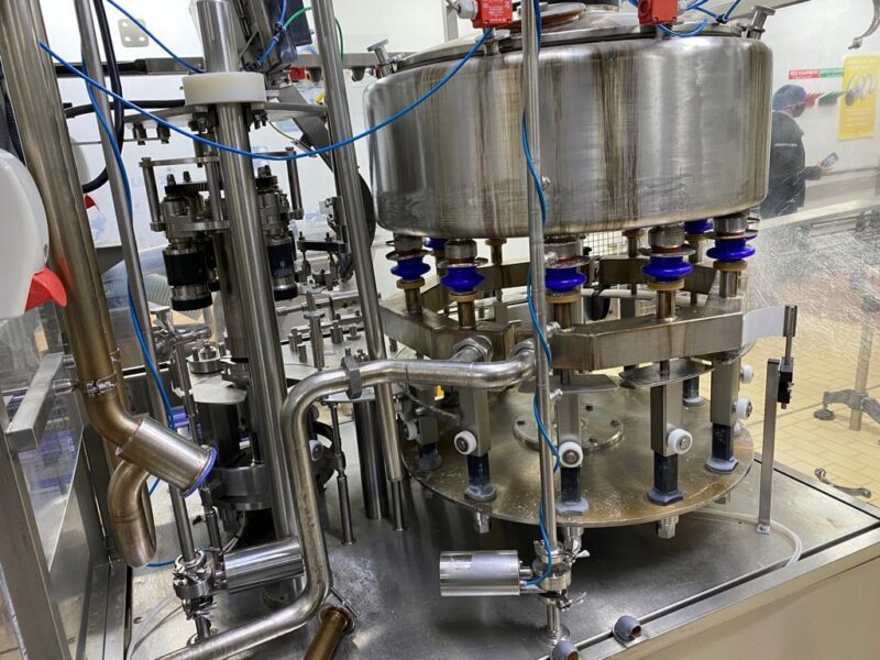 Dawson 12-Head Filler with 4-Head Integrated Capper Bottle Filling Line - Image 4