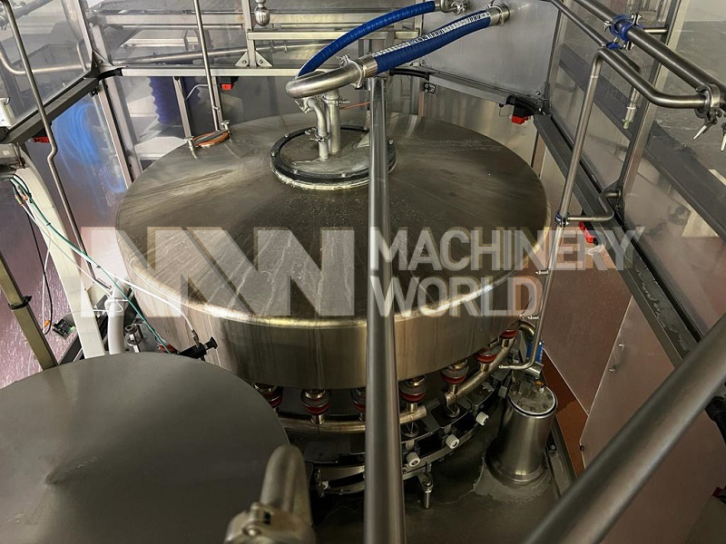 Dawson 30-10 PET Plastic Bottle Filling Line with Unscrambler, Rinser, Sleever & Shrink Wrapper - Image 3